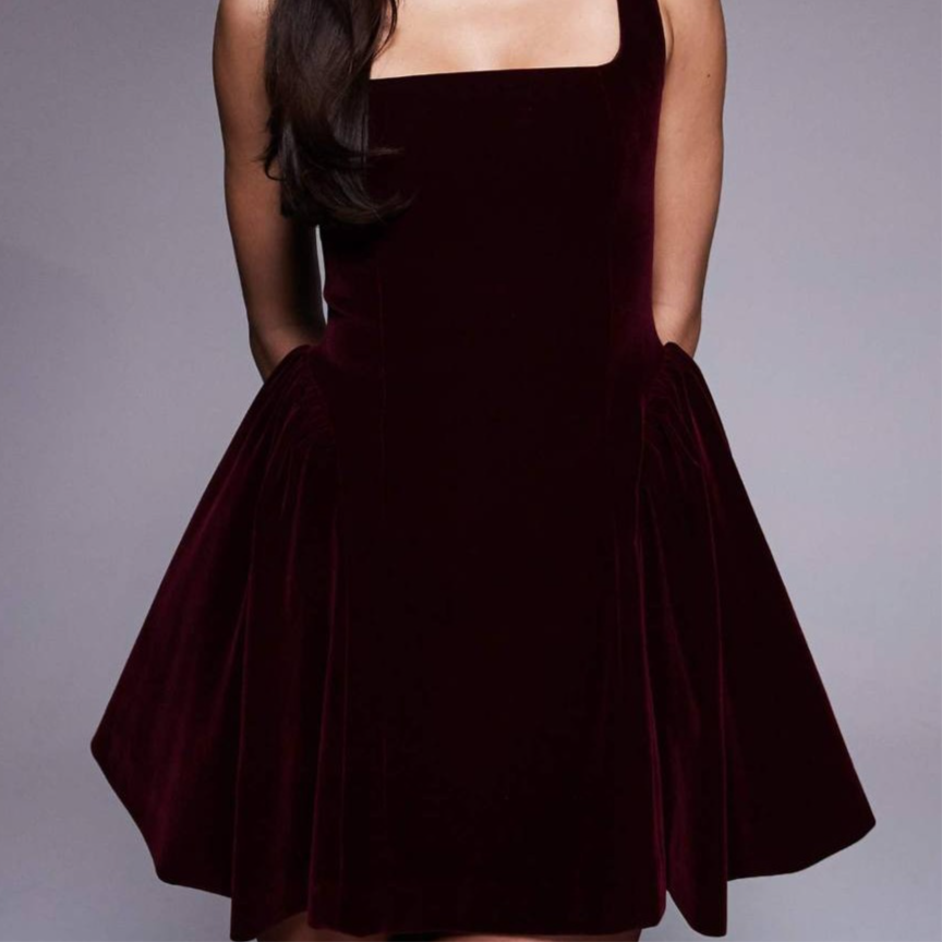 Short burgundy velvet dress with square neckline and hip detail